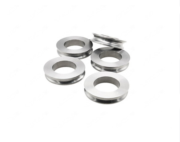 Tungsten carbide rollers and rings round